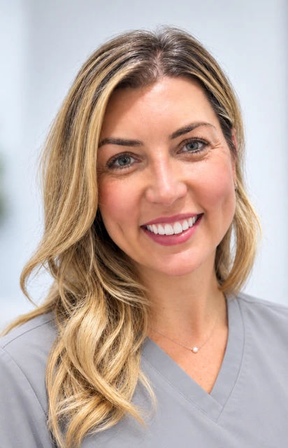 Dr Andrea Kadar